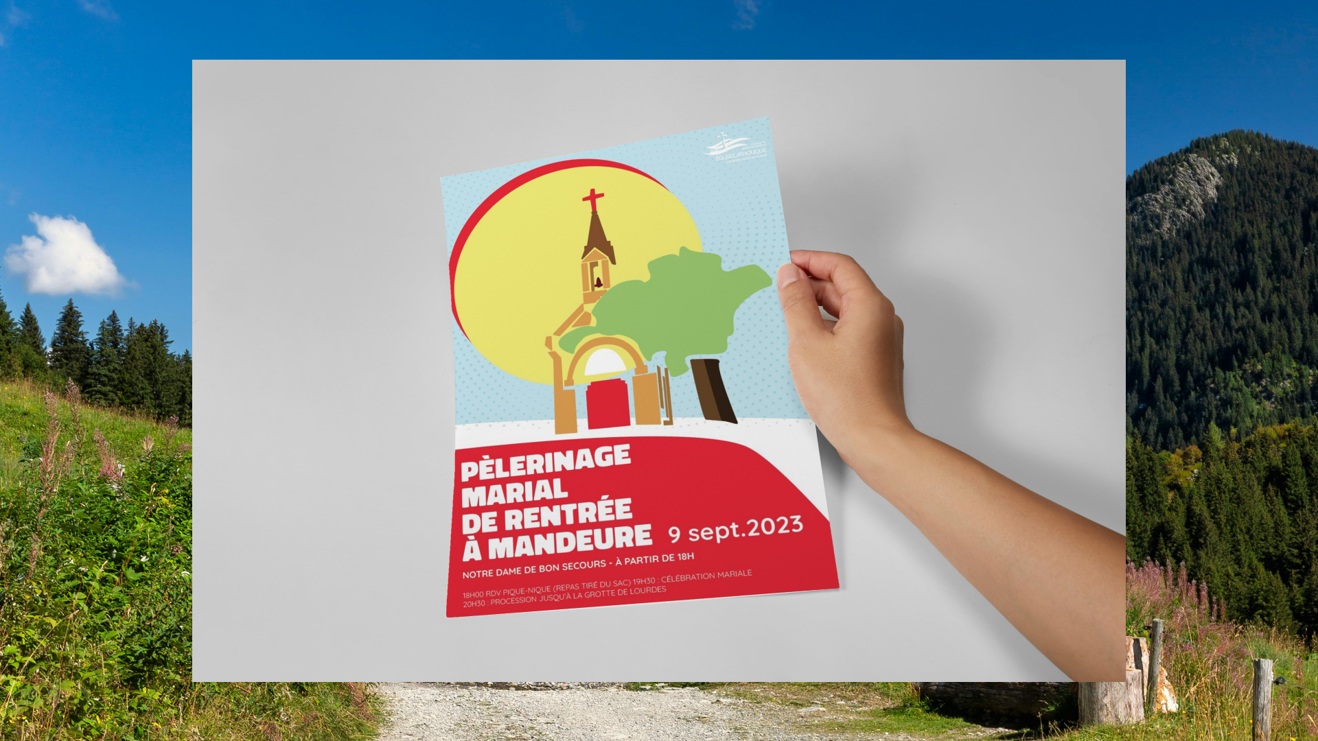 affiche tenue par une main